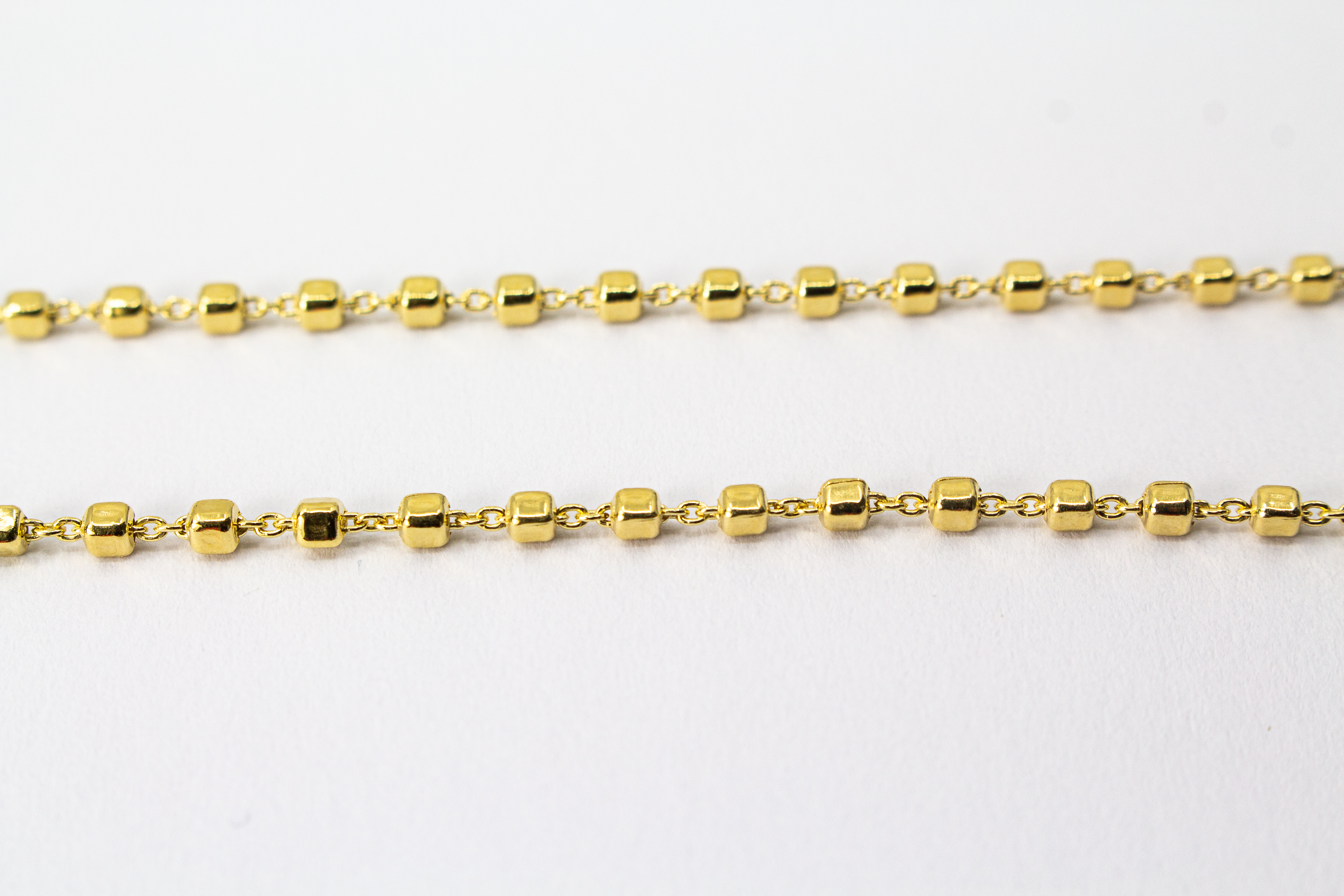 „Moderne Würfel-Halskette von der Goldschmiede Regina Kraus aus 20 Mikron vergoldetem 925er Sterlingsilber, Kategorie Ketten und Colliers.