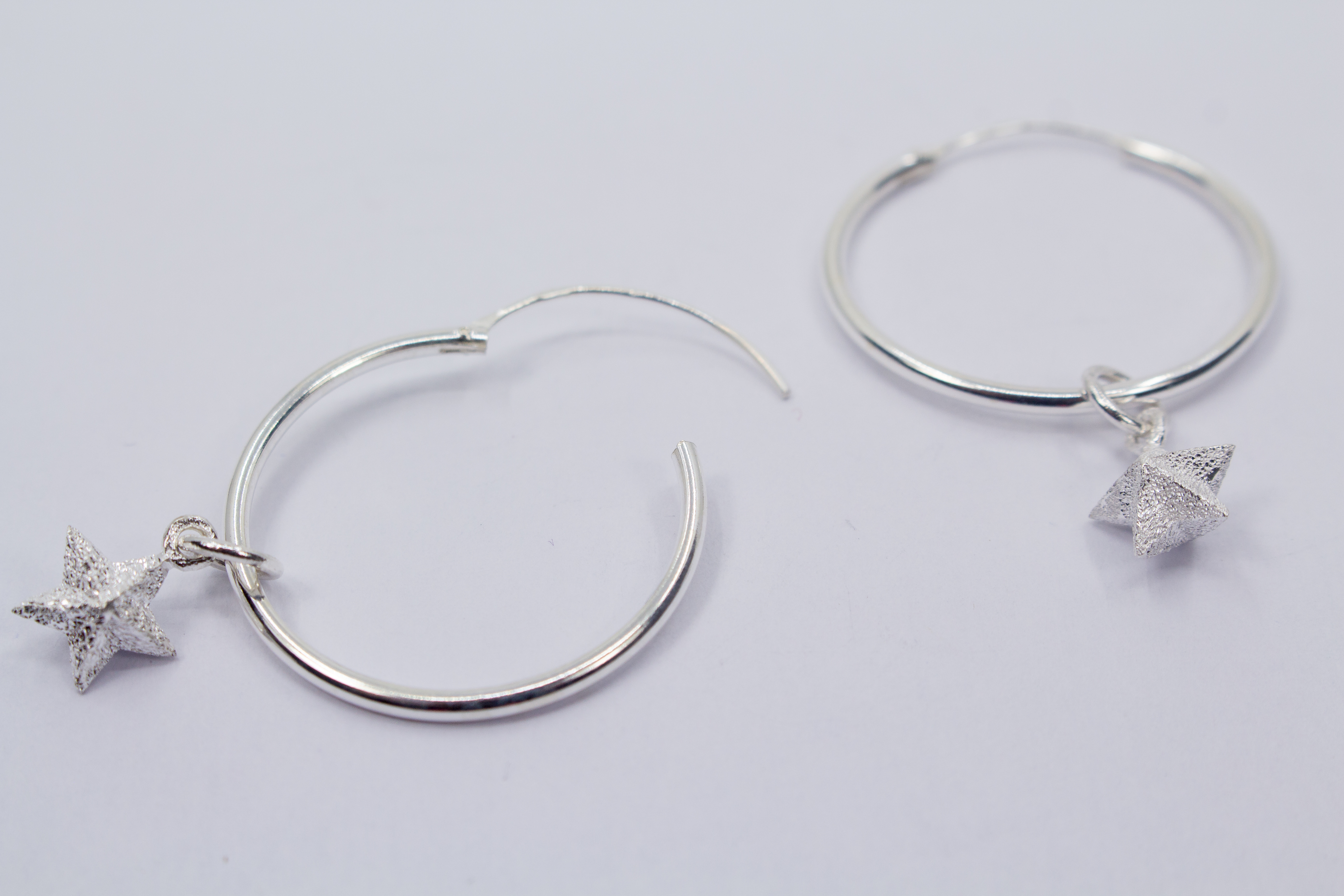 Wechselcreolen mit Sternanhänger